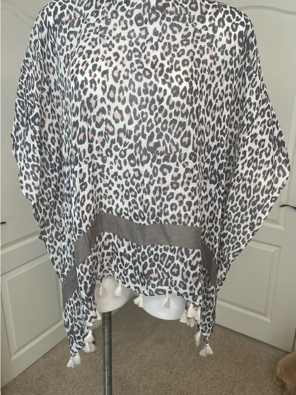 Demdaco White and Gray Leopard Tassel Poncho Tunic
